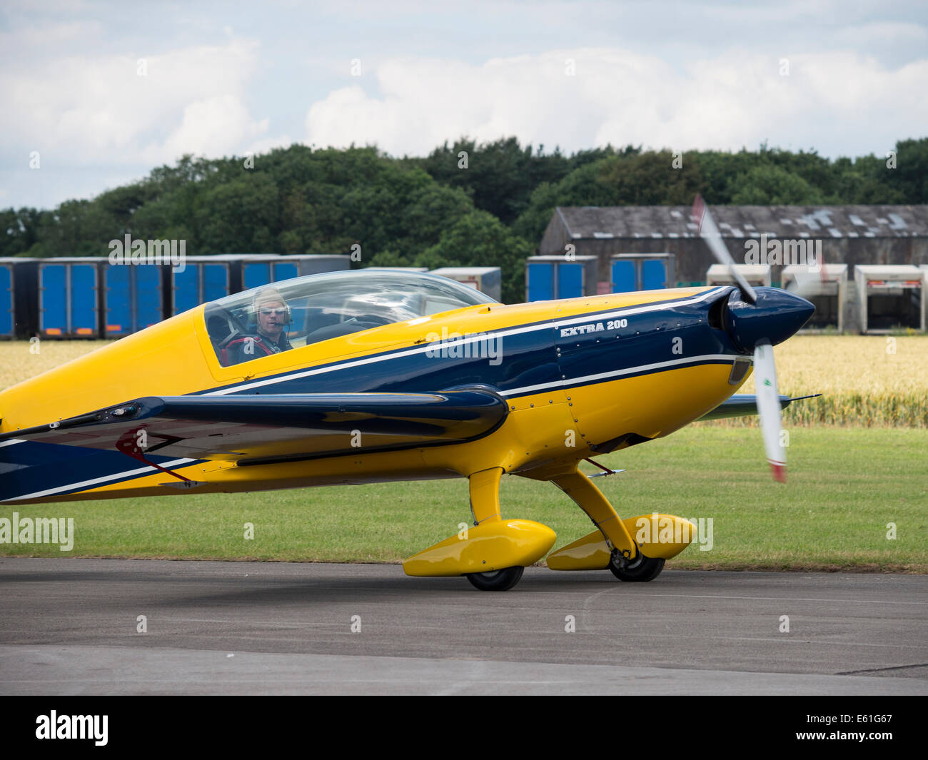 An Extra 200 aerobatic stunt aircraft at Breighton airfield, Yorkshire, UK Stock Photo