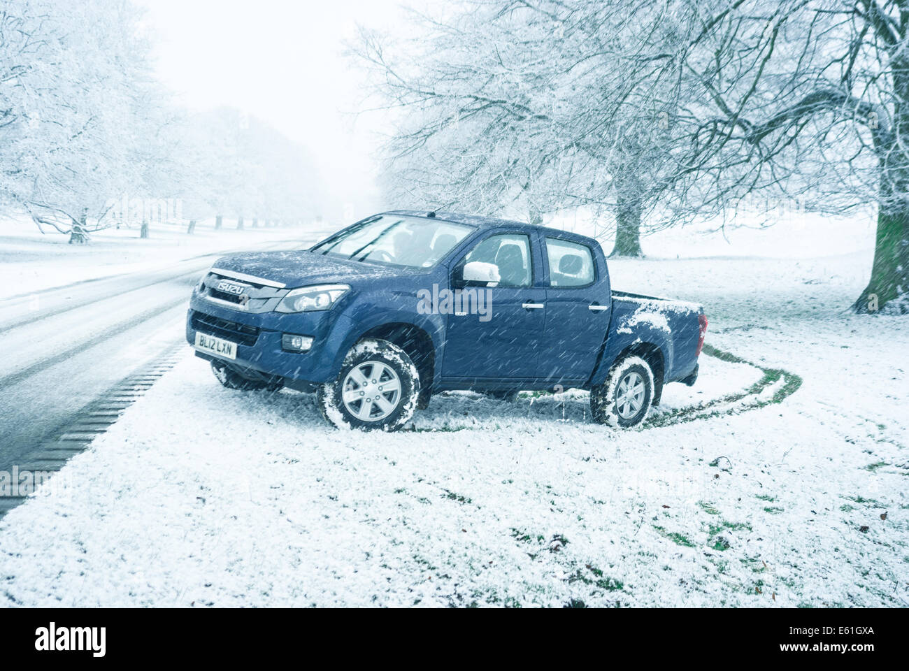The capable Isuzu D-Max Eiger pickup truck offroad in winter/snow Stock Photo