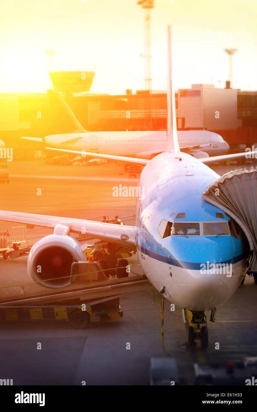 plane parked at the airport Stock Photo - Alamy