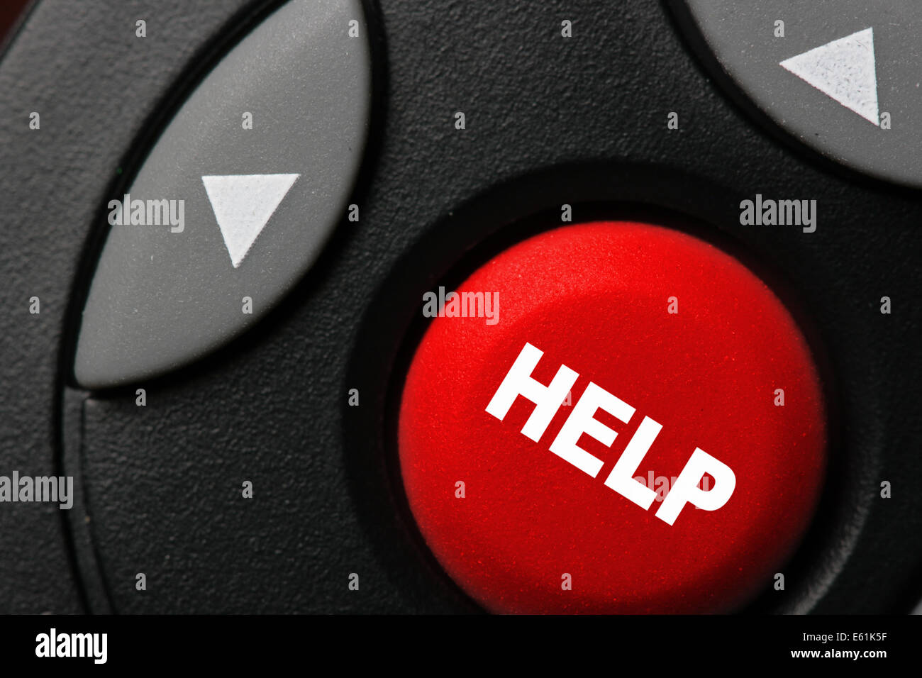 Big red button with word HELP close-up Stock Photo