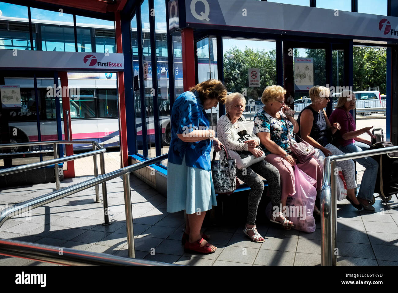 People queueing in Basildon Bus Station. Stock Photo