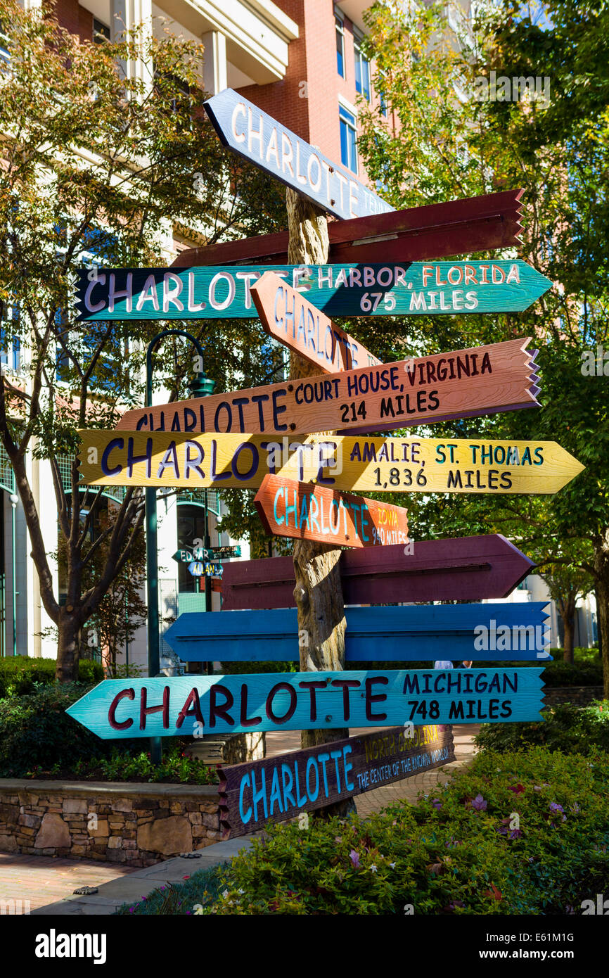 Signs for different 'Charlottes' on The Green, just off South Tryon Street, Charlotte, North Carolina, USA Stock Photo