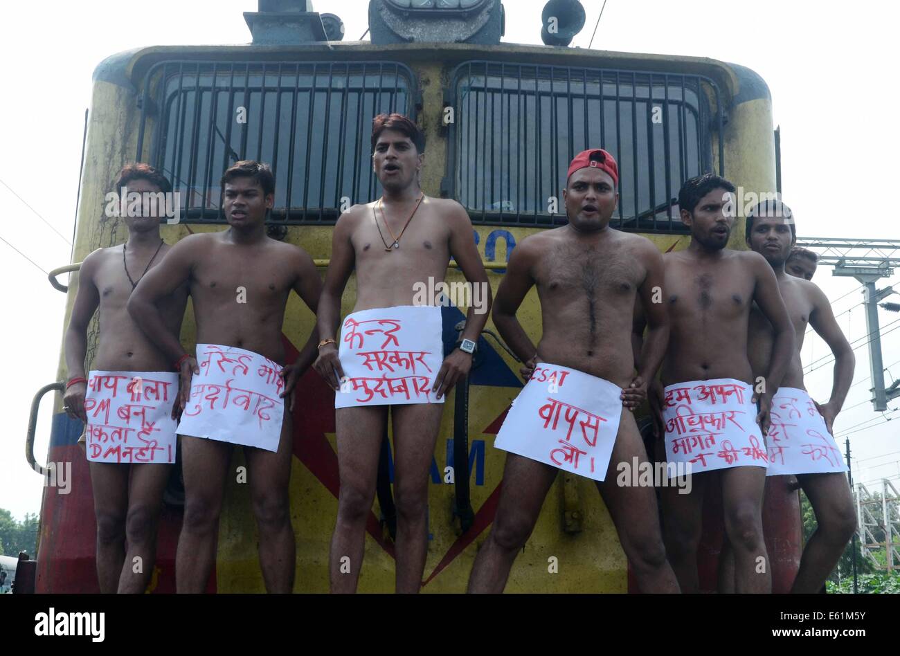Allahabad, India. 11th Aug, 2014. Samajwadi Party Students take nude  protest stopping the Janta Express Train