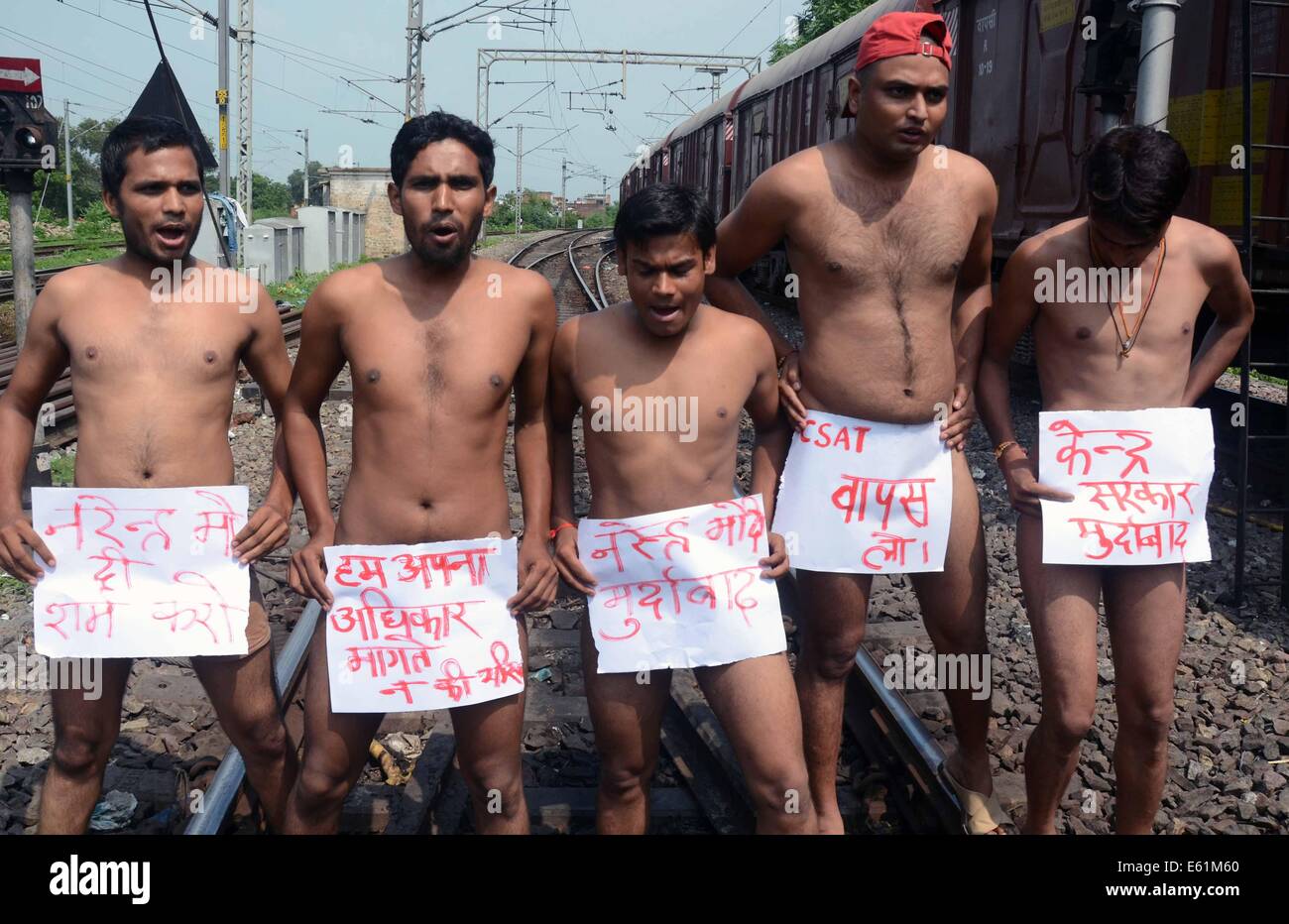 Allahabad, India. 11th Aug, 2014. Samajwadi Party Students take nude  protest stopping the Janta Express Train