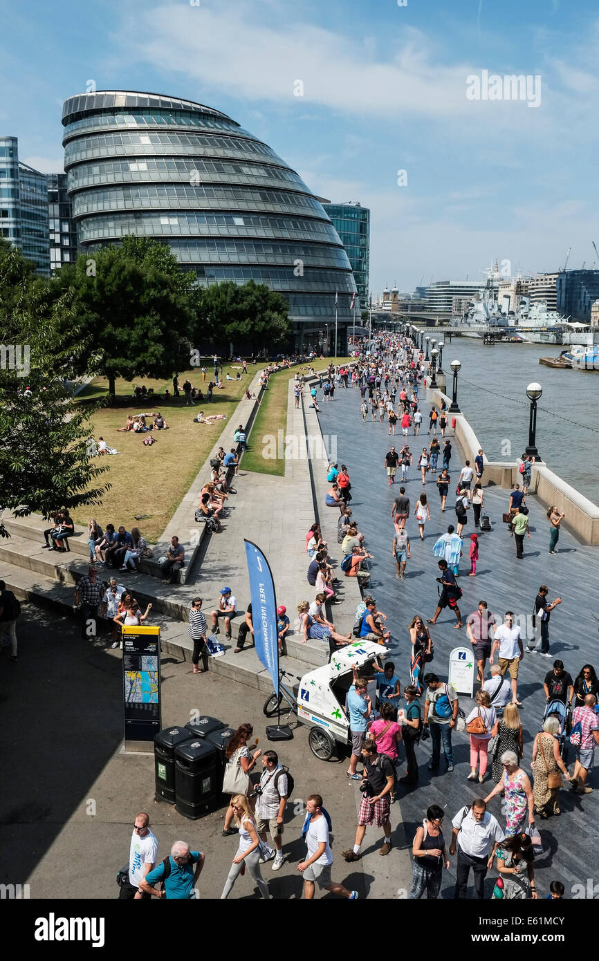 Tourists on the South Bank in London. Stock Photo
