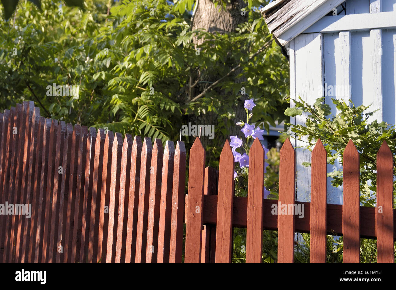 red painted wooden fence, Sweden Stock Photo