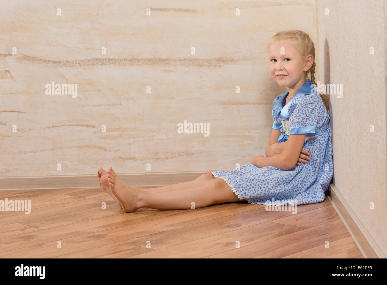 Young Beautiful Female in White and Blue Dress Sitting on Floor ...