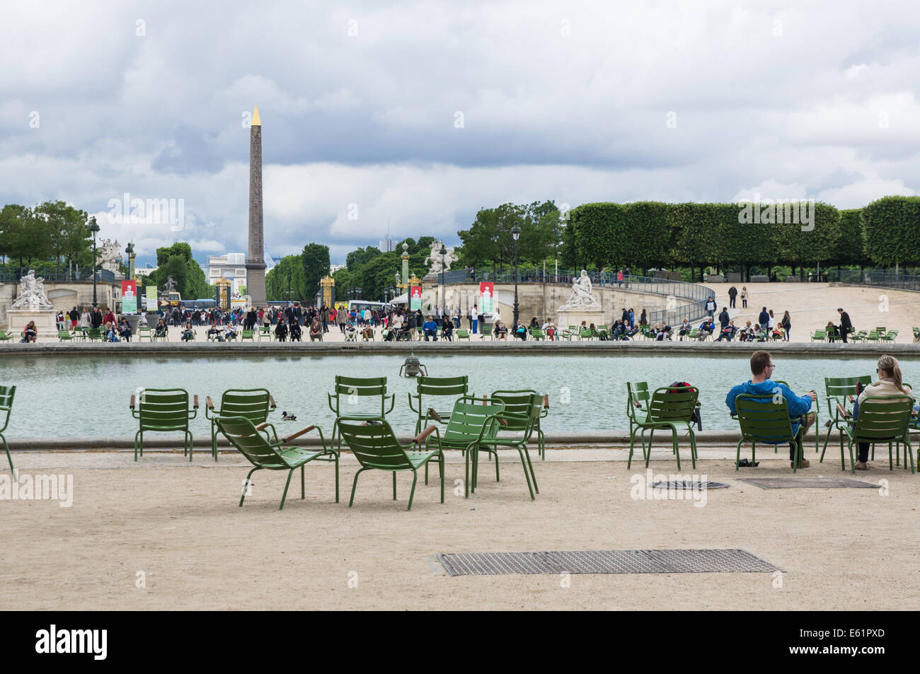 Tourists and visitors at the Grand Bassin Octogonal in  the Tuileries Garden [Jardin des Tuileries] in Paris, France Stock Photo