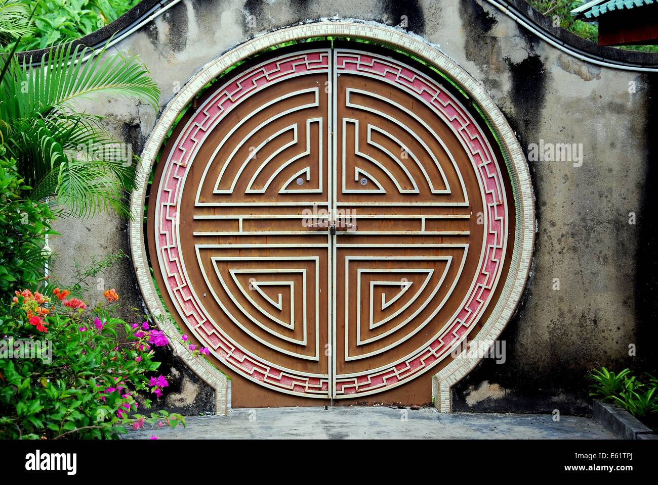 PENANG, MALAYSIA:  A laybrinth doorway in the gardens at the Snake Temple on Penang Island  * Stock Photo