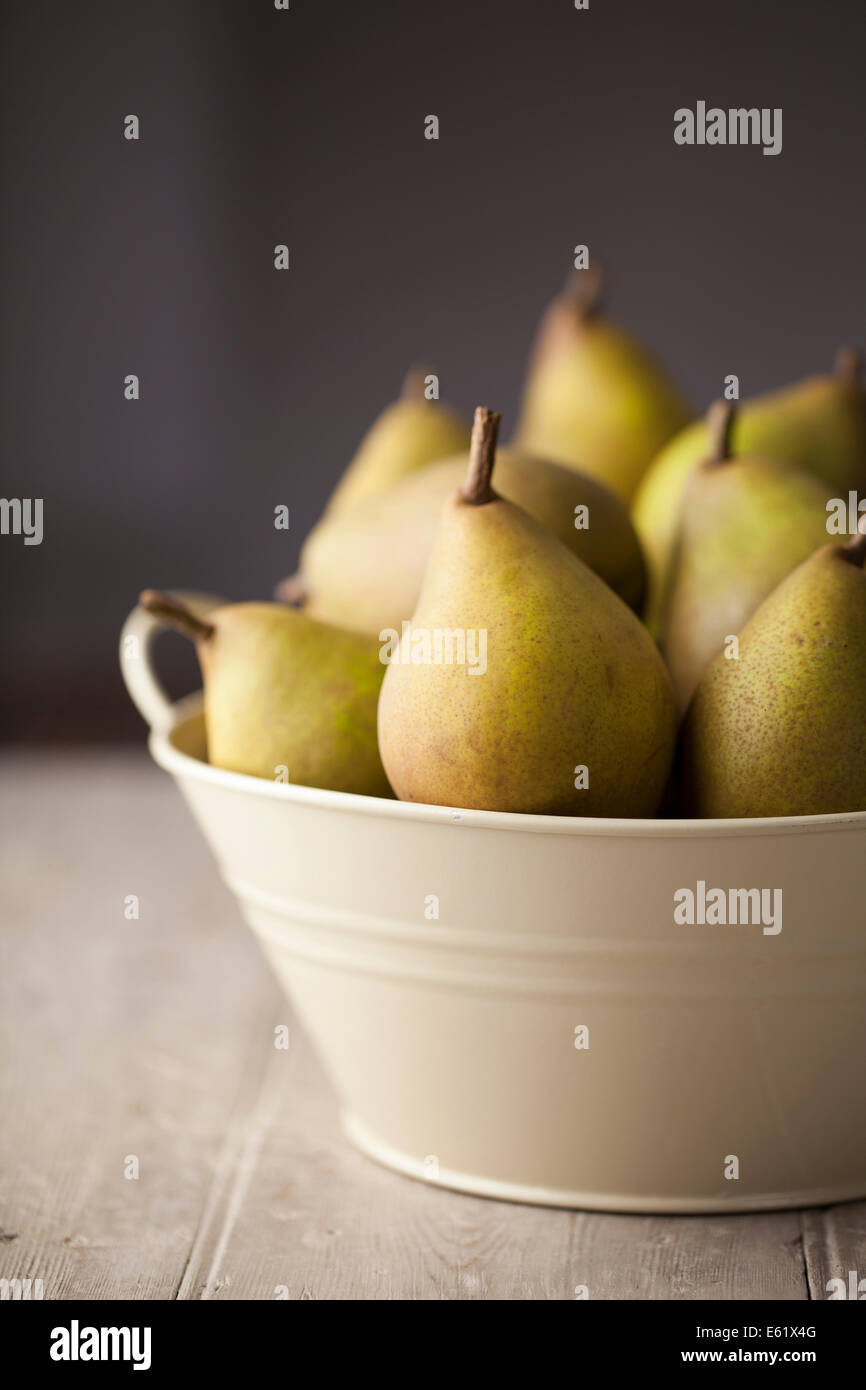 Beurre Hardy Pears in Enamel Bowl Stock Photo