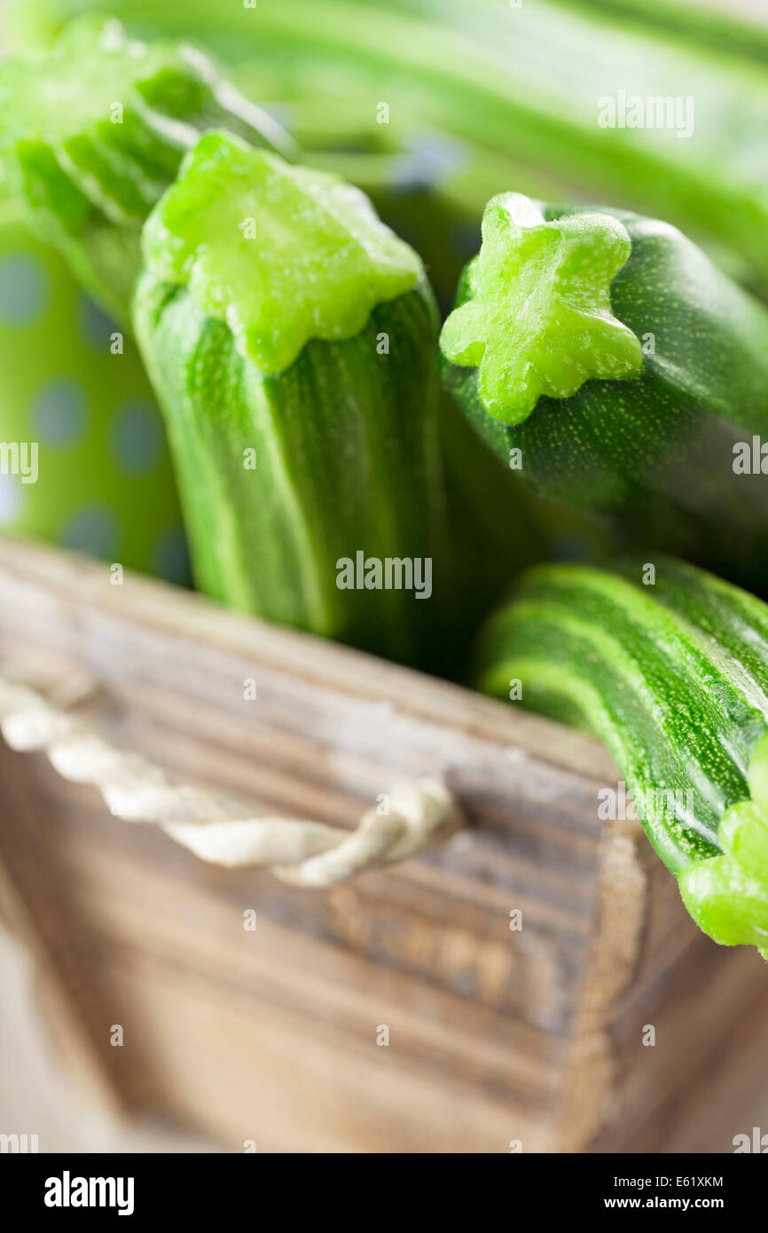 Courgettes in Wooden Box Stock Photo