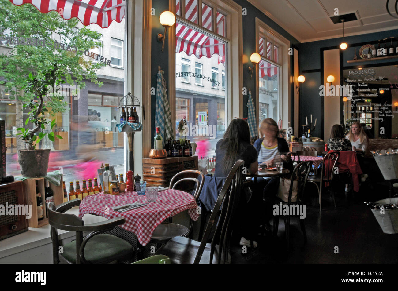 People, faces, restaurants and hair parlors along streets of Reykjavik in Iceland Stock Photo