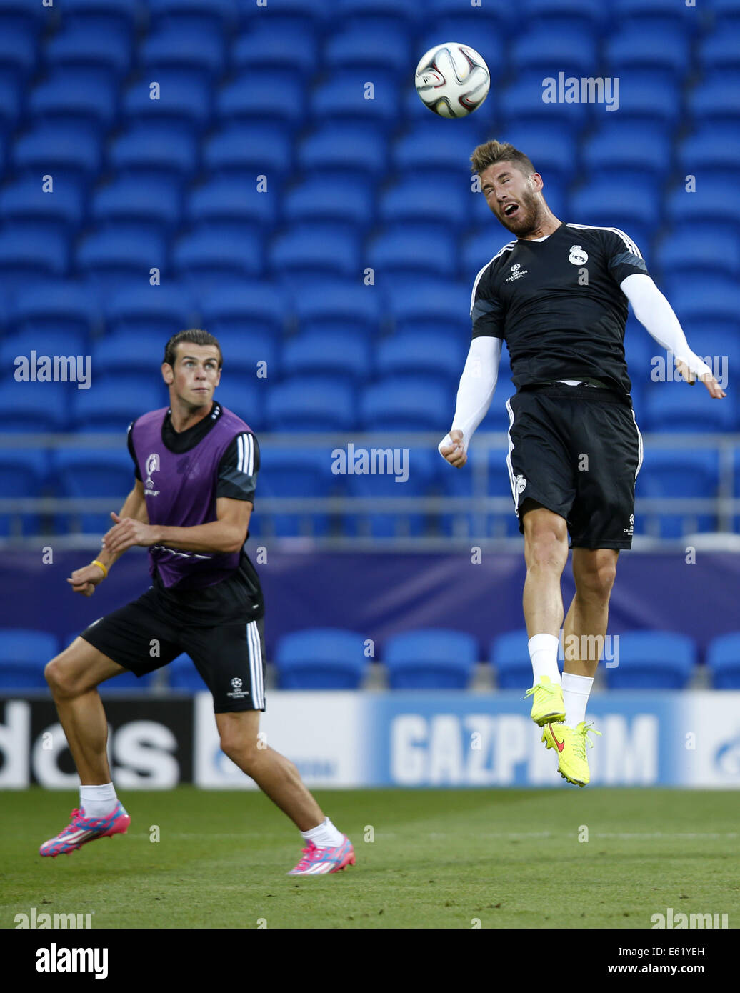 Cardiff. 11th Aug, 2014. Ramos(R) and Gareth Bale of Real Madrid take a training session for the UEFA Super Cup match between Real Madrid and Sevilla at Cardiff City Stadium in Cardiff, Britain on Aug. 11, 2014. © Wang Lili/Xinhua/Alamy Live News Stock Photo
