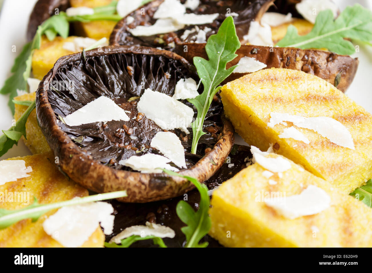 Balsamic marinated portobello mushrooms with grilled slices of polenta