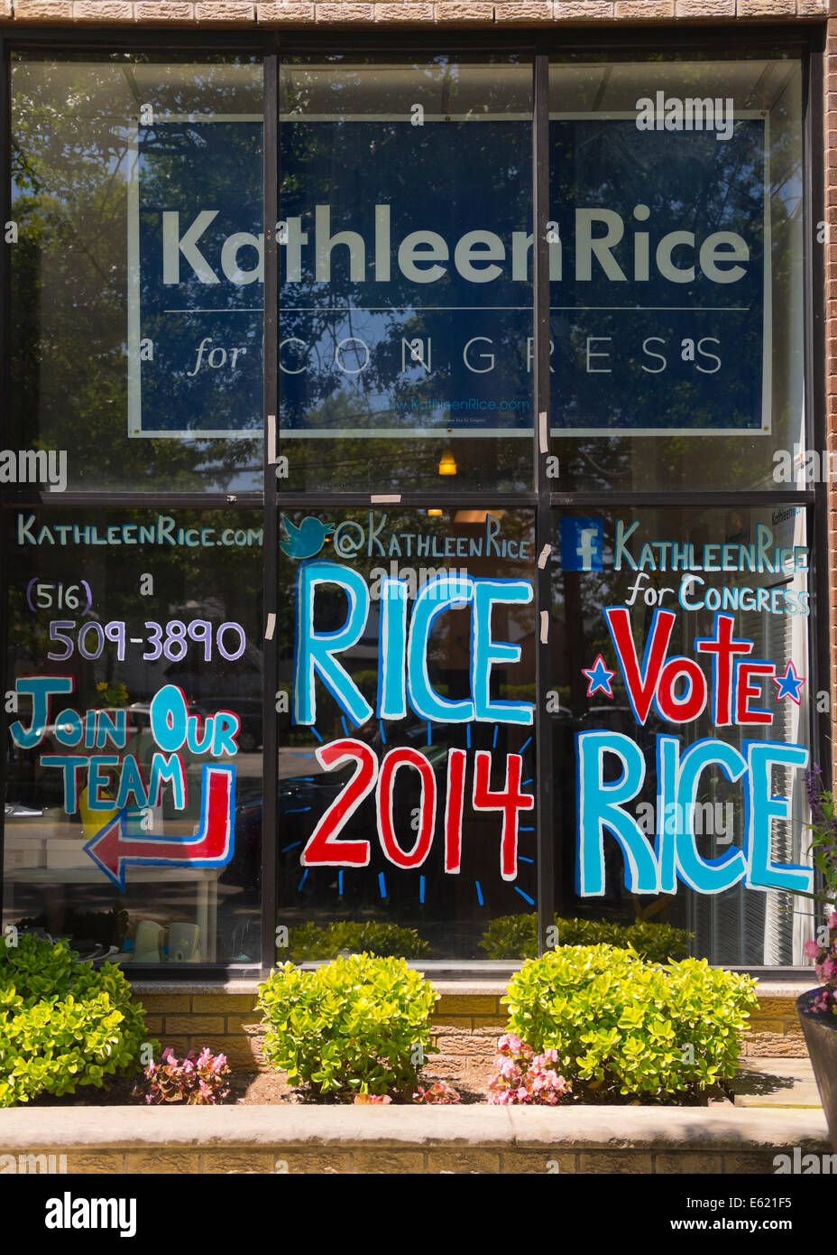 Garden City South, New York, U.S. - August 11, 2014 - Kathleen Rice's Campaign Field Office is the press conference location where Rice, the Democratic candidate for Congress in New York's 4th Congressional District, was endorsed by NARAL Pro-Choice New York and Planned Parenthood of Nassau County Action Fund, NARAL. The office's front window has Rice 2014 in red white and blue. Rice is in her third term as Nassau County District Attorney, Long Island. Credit:  Ann E Parry/Alamy Live News Stock Photo