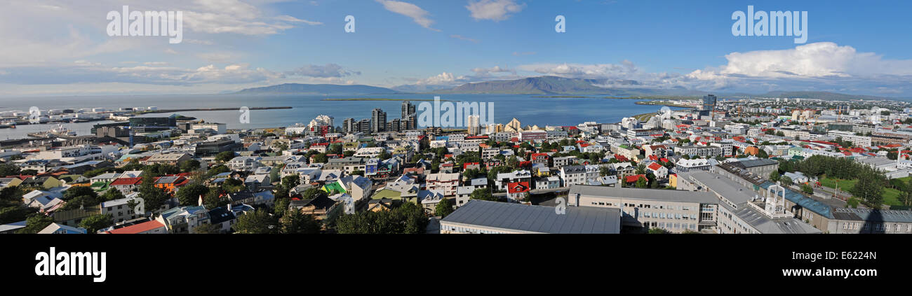 View over Reykjavik with mountains looming in the distance, Reykjavik, Iceland, Polar Regions Stock Photo