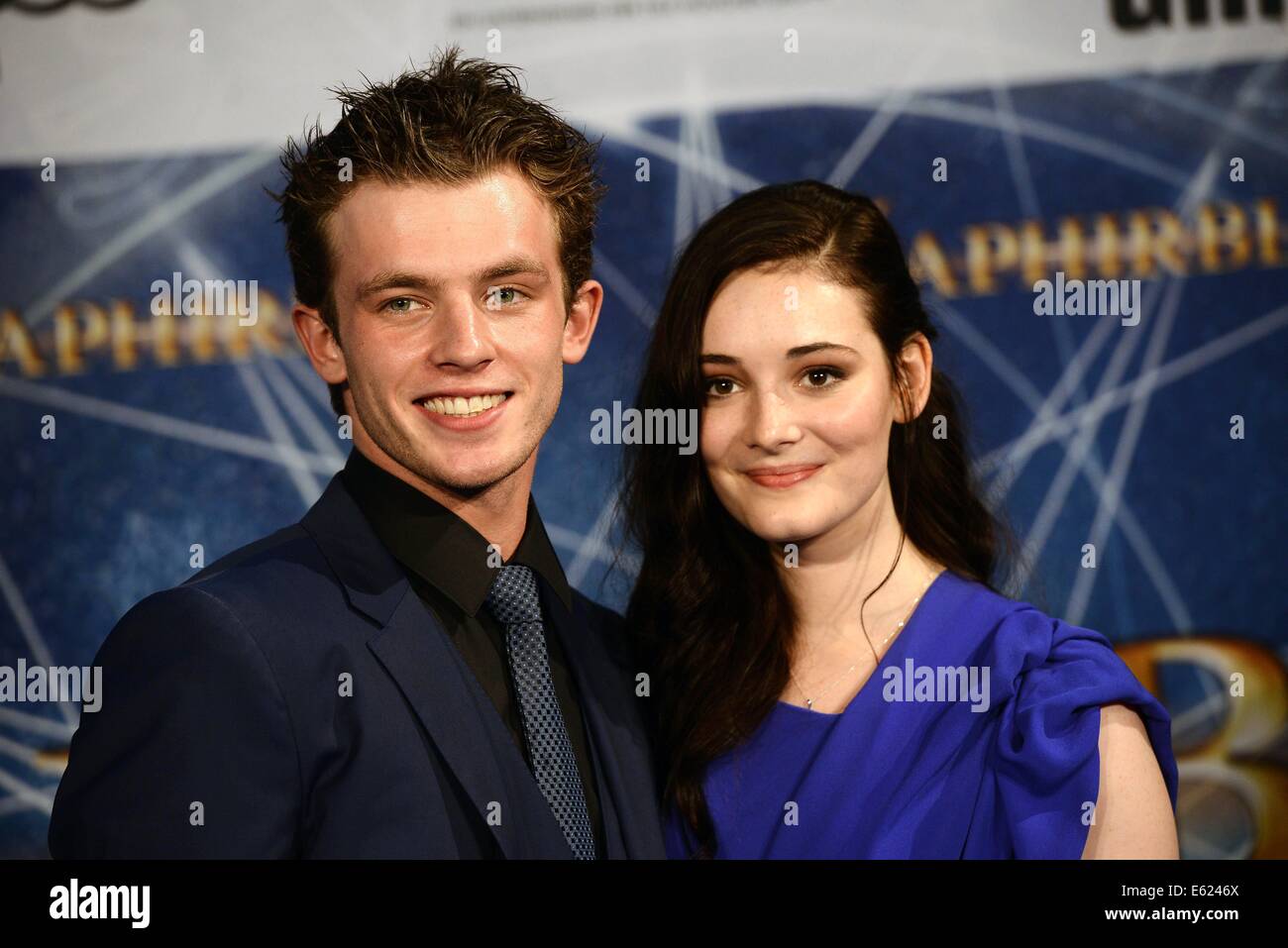 Cologne, Germany. 11th Aug, 2014. Actors Jannis Niewoehner and Maria Ehrich pose before the premiere of the film 'Sapphire Blue' in Cologne, Germany, 11 August 2014. The film will come to German cinemas on 14 August 2014. Photo: Henning Kaiser/dpa/Alamy Live News Stock Photo