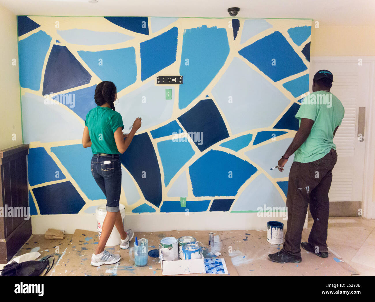 painters working on abstract image, Melia Hotel, Cable Beach, The Bahamas Stock Photo