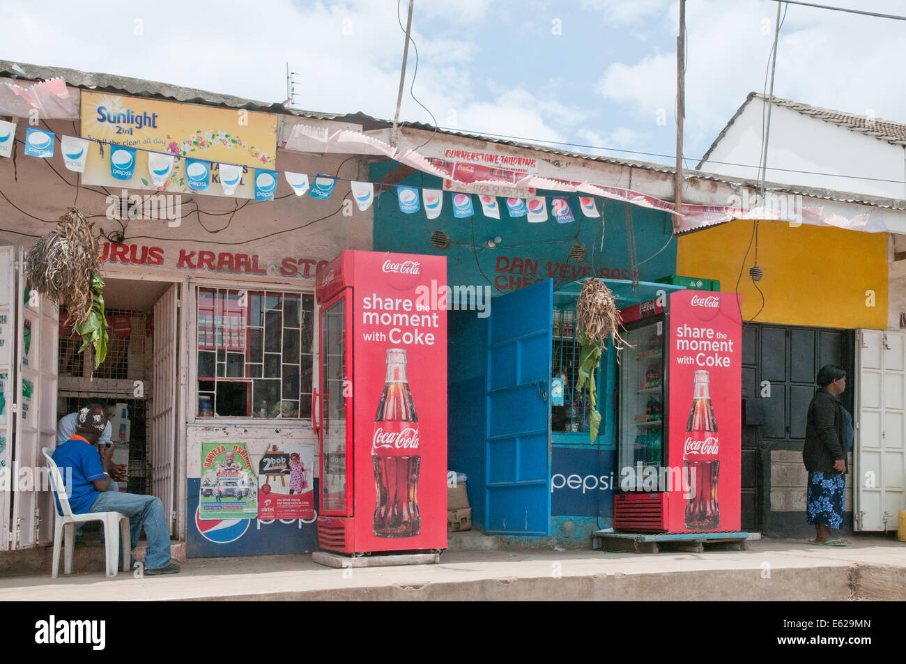 Coca Cola on sale outside typical low quality shops or dukas in Nairobi South C district Kenya Africa Stock Photo