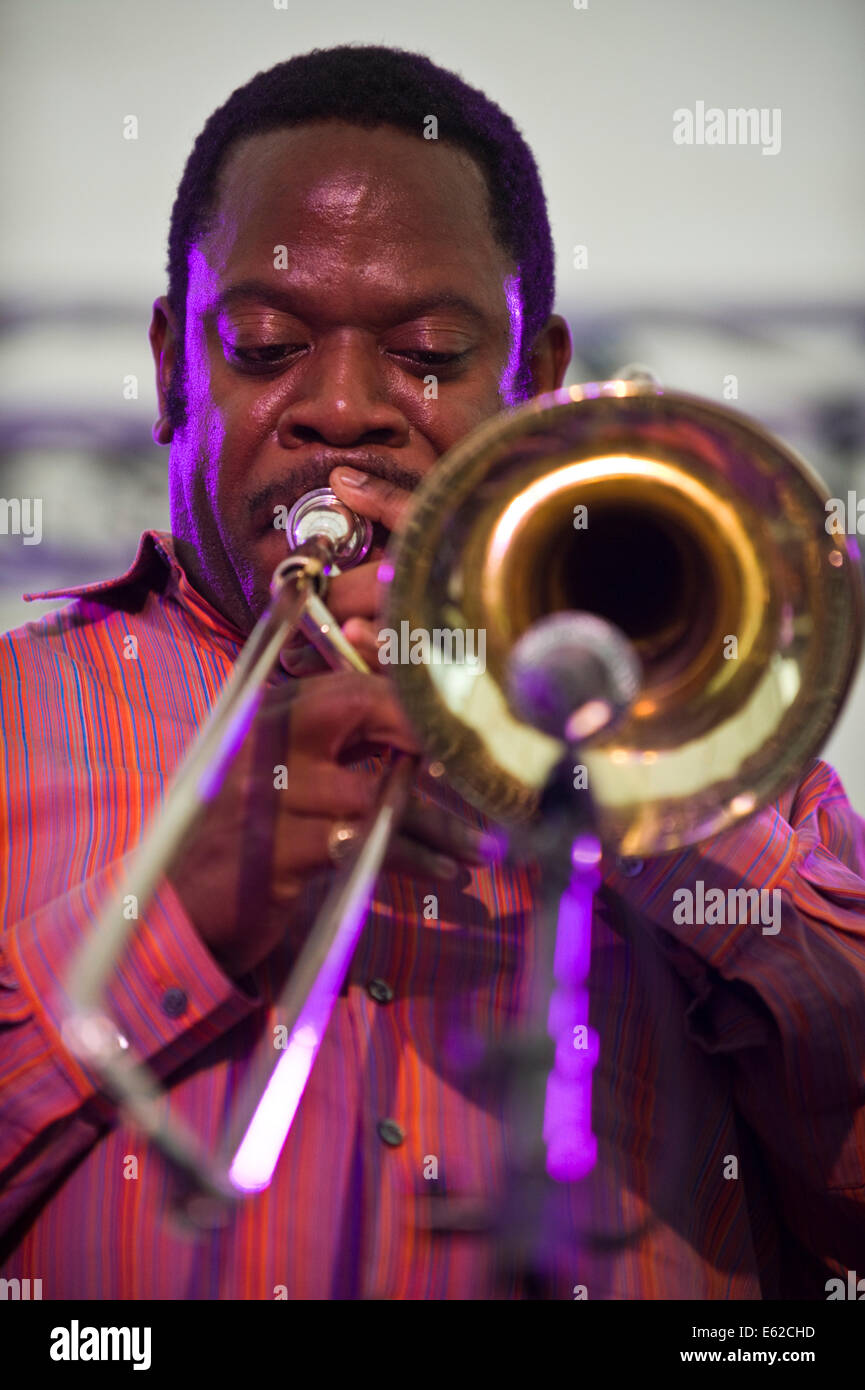 Trombone player with Township Comets jazz band from South Africa ...