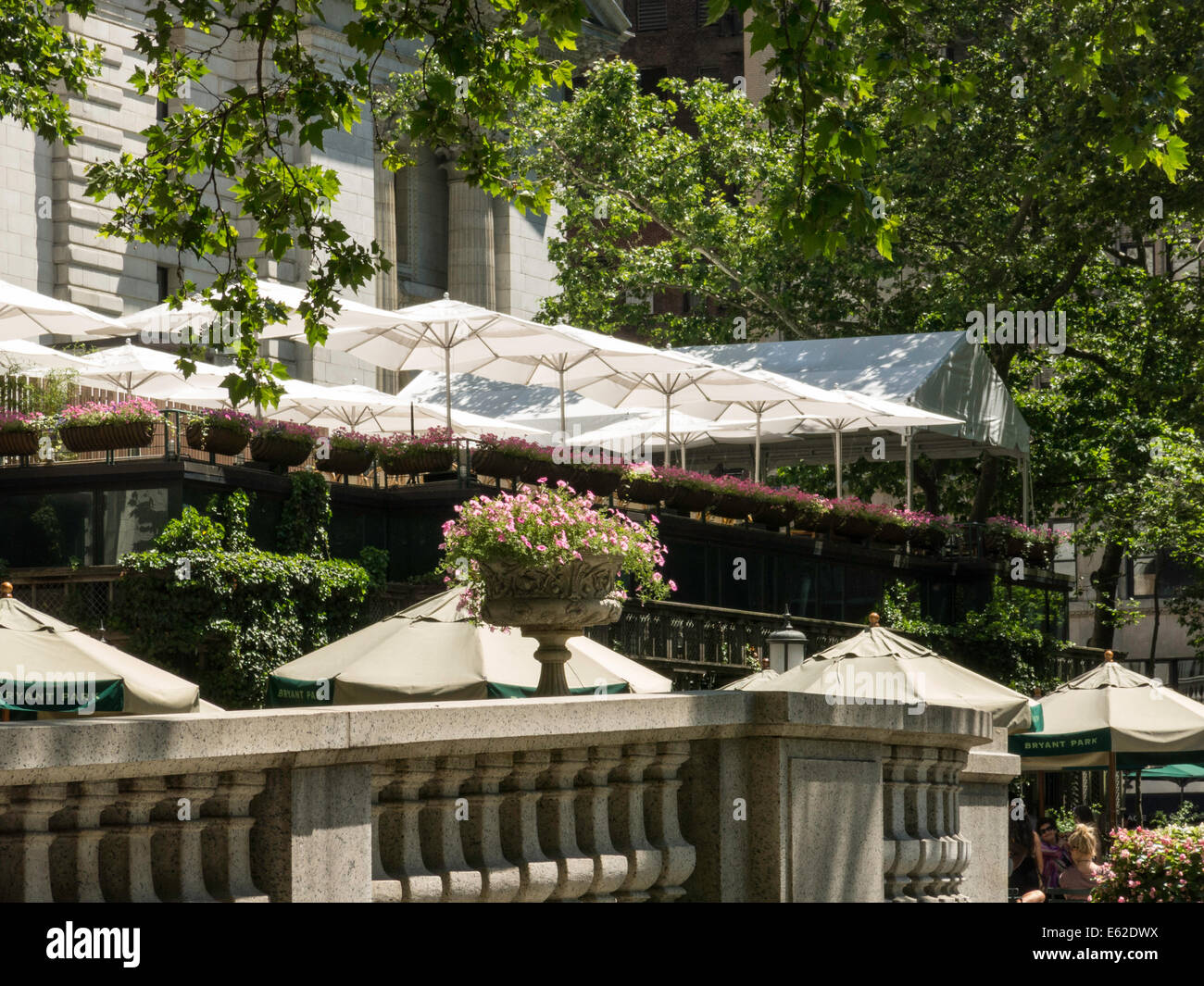 Bryant Park Grill Restaurant and Umbrellas in Bryant Park, NYC Stock Photo