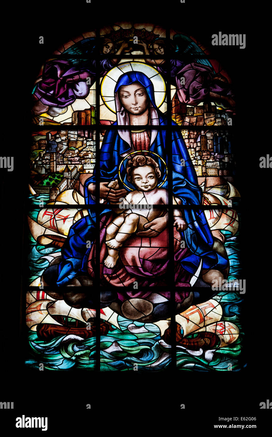 Virgin Mary With Baby Jesus And Sailing Ships With Cross Of The Order Stock Photo Alamy