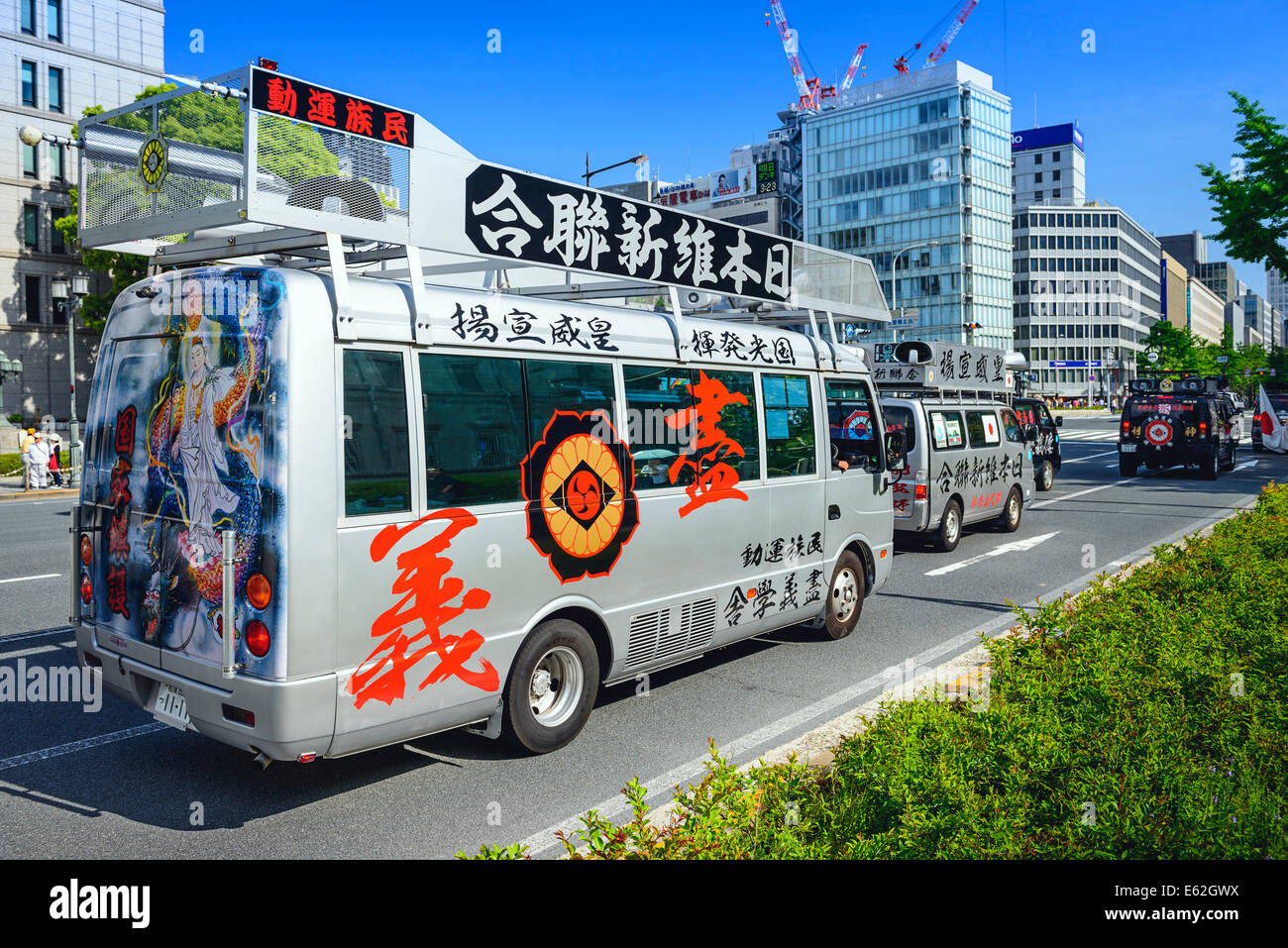 A caravan of right wing Uyoku dantai vans drives through Osaka. Stock Photo