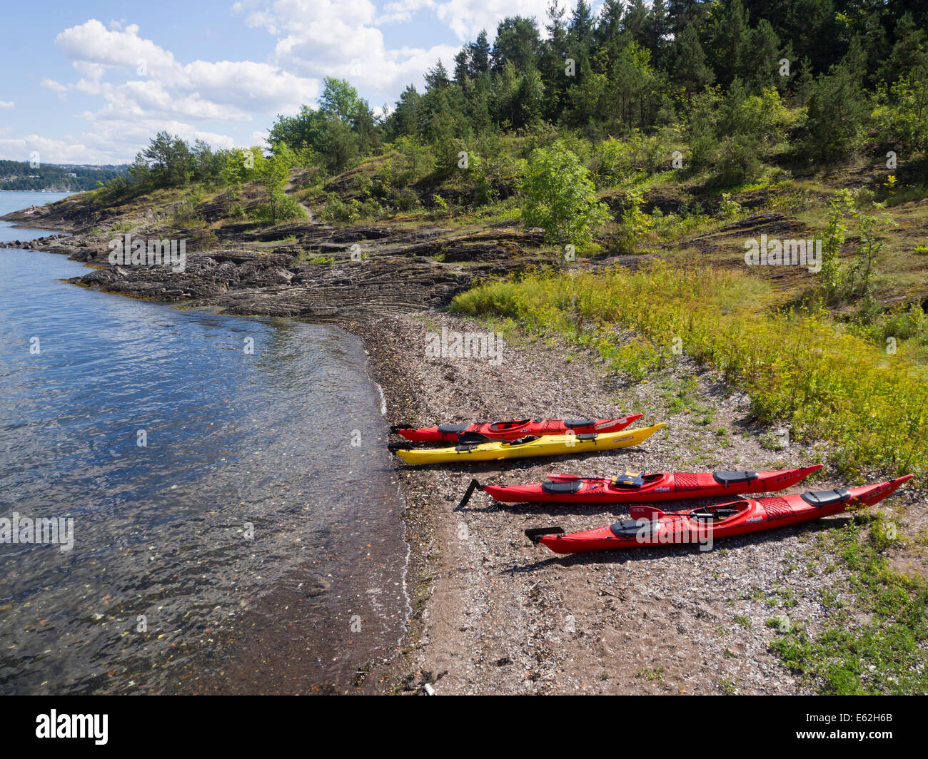 Summer in Oslo Norway, one activity is to rent sea kayaks, here they are  ready for a day from island to island on the Oslo fjord Stock Photo