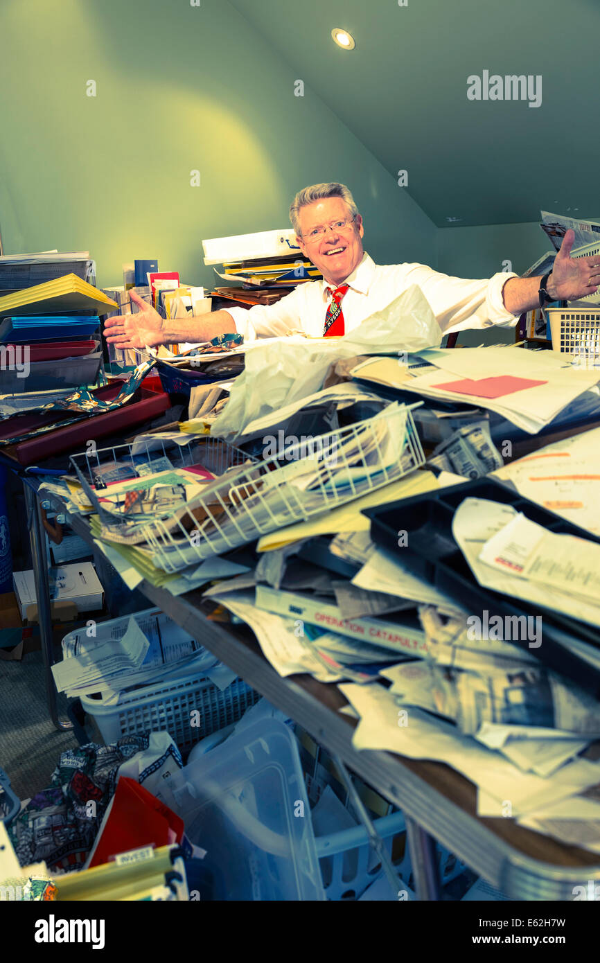 Businessman in Hoarders' Messy Home Office, USA Stock Photo Alamy
