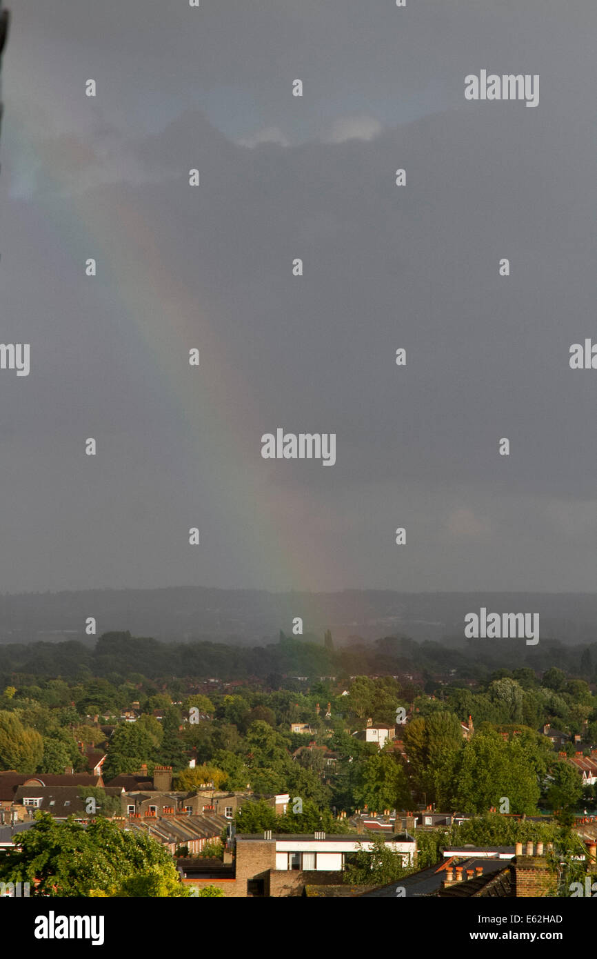 Wimbledon, London, UK. 12th Aug, 2014. Weather A rainbow appears after