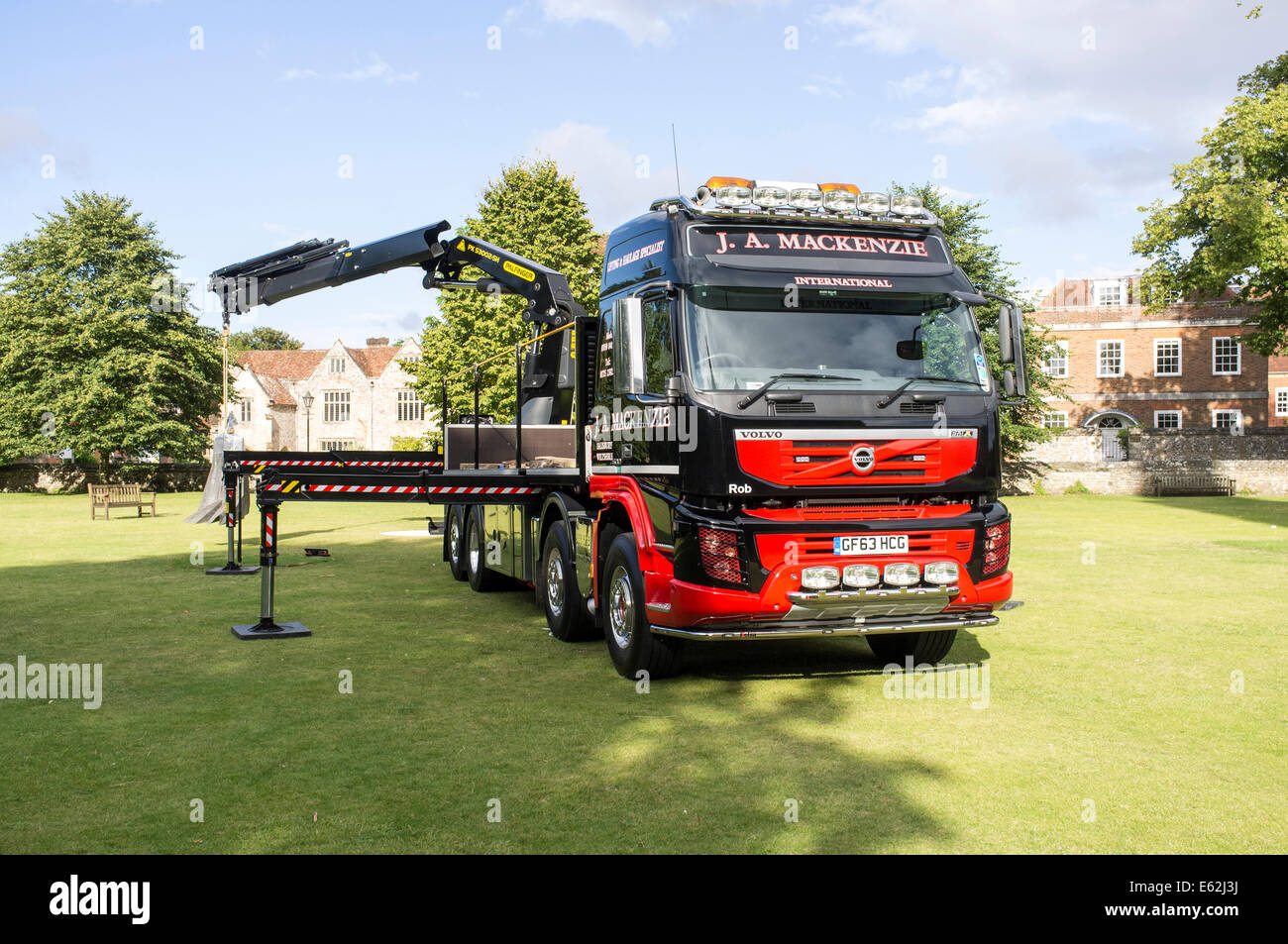 Volvo truck with Palfinger crane with stabilizers extended Stock Photo