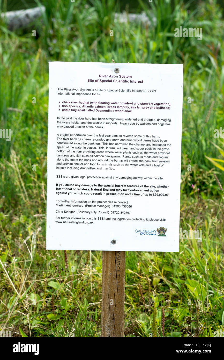 Small sign next to River Avon Salisbury UK indicating an SSSI site of special scientific interest Stock Photo