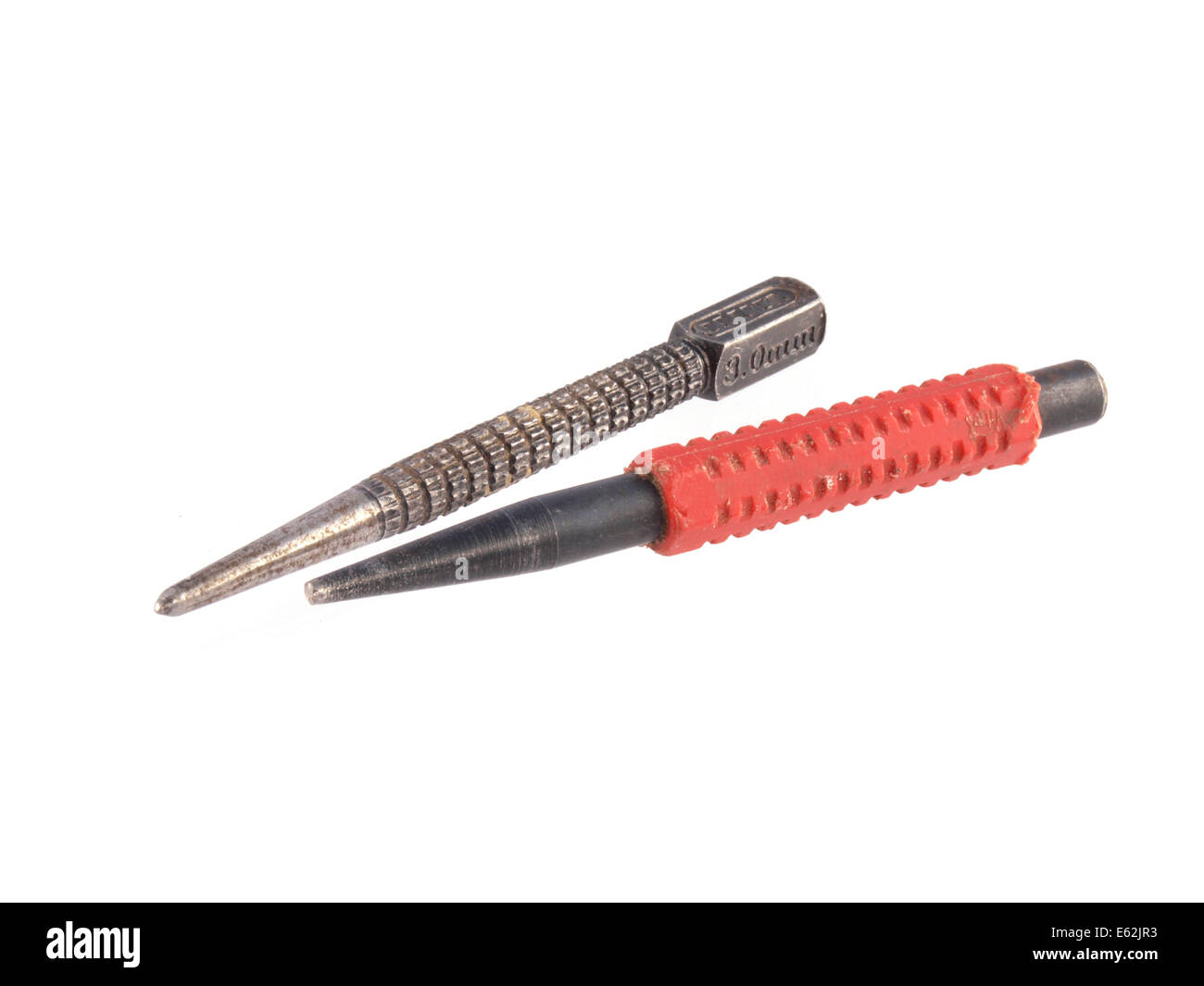Close up photo of two nail punches on a white background. Stock Photo