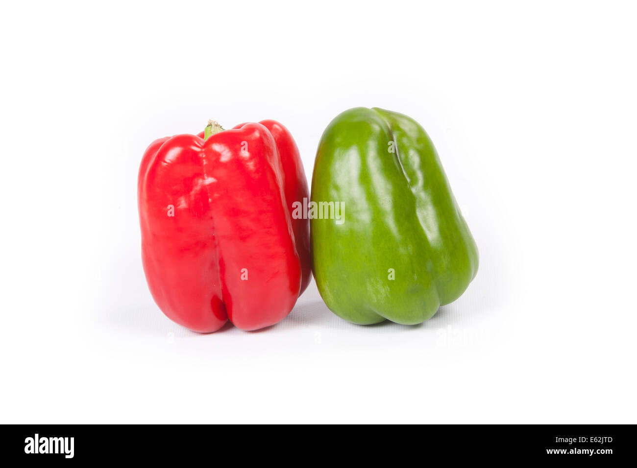 Fresh red and green bell peppers Stock Photo Alamy
