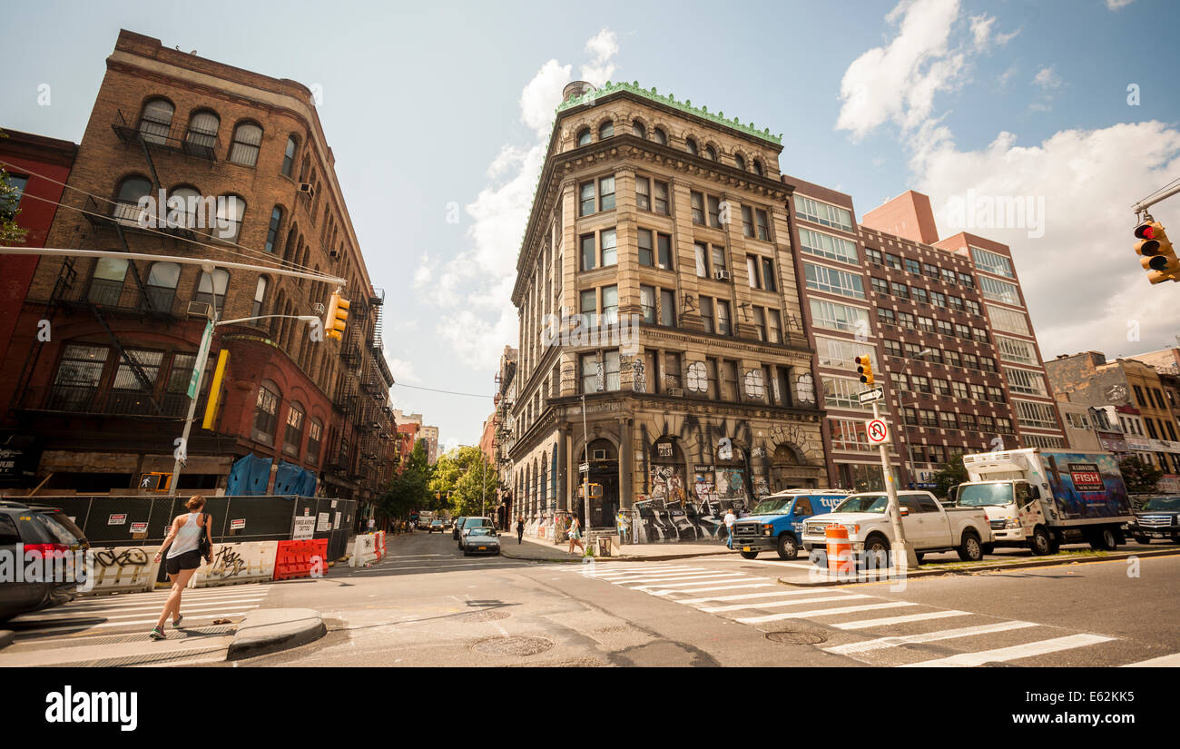 The 1898 landmark former Germania Bank Building, center, on the corner of the Bowery and Spring Street in New York Stock Photo