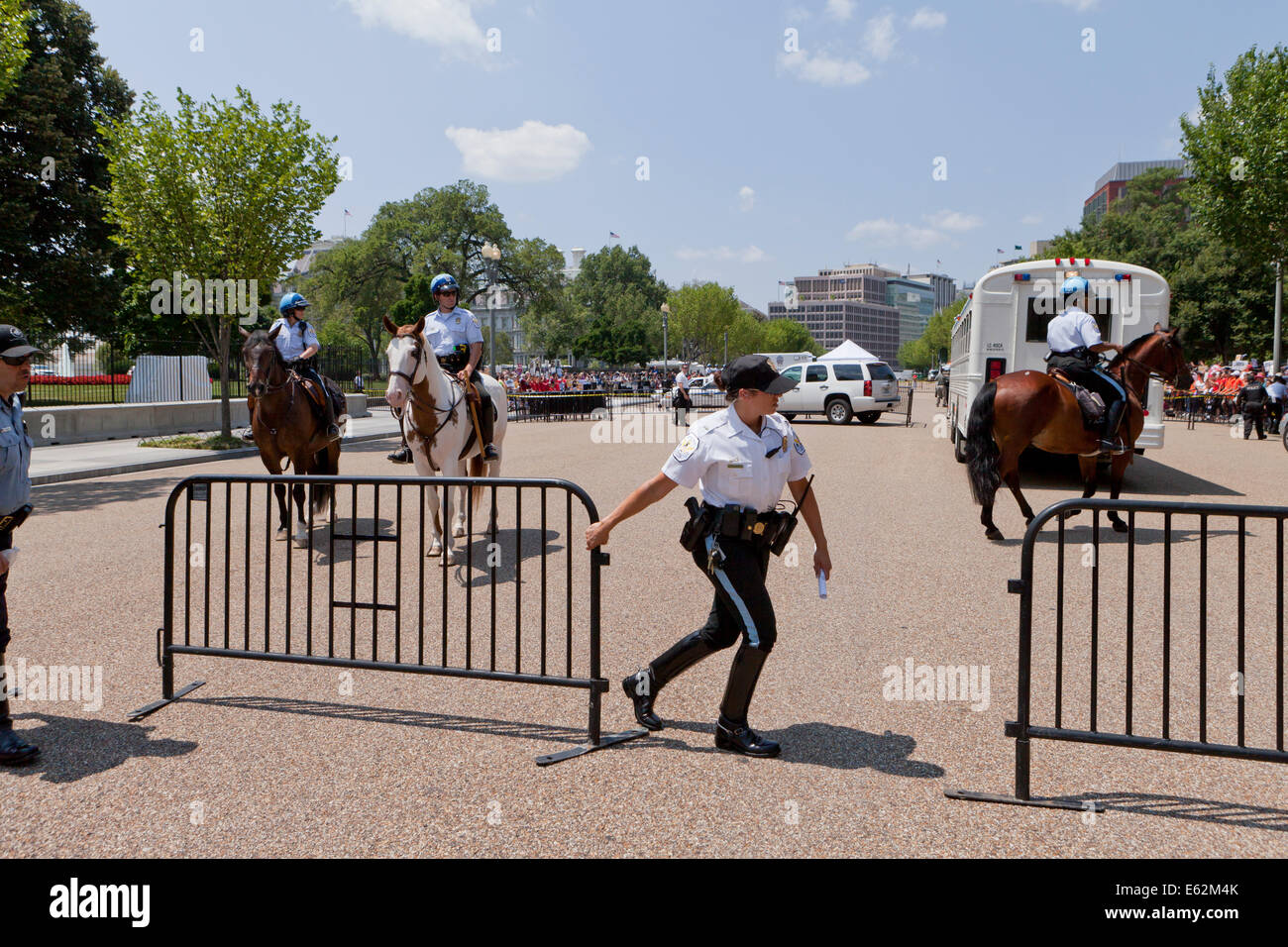 Police moving barricade fences - Washington, DC USA Stock Photo