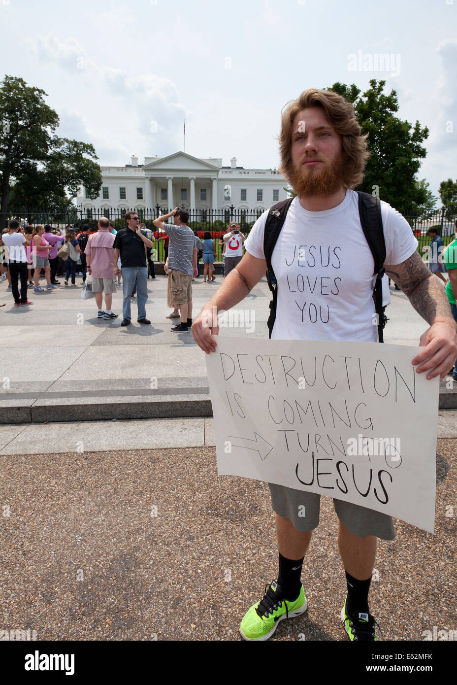 Man holding Christian message sign in front of the White House - Washington, DC USA Stock Photo