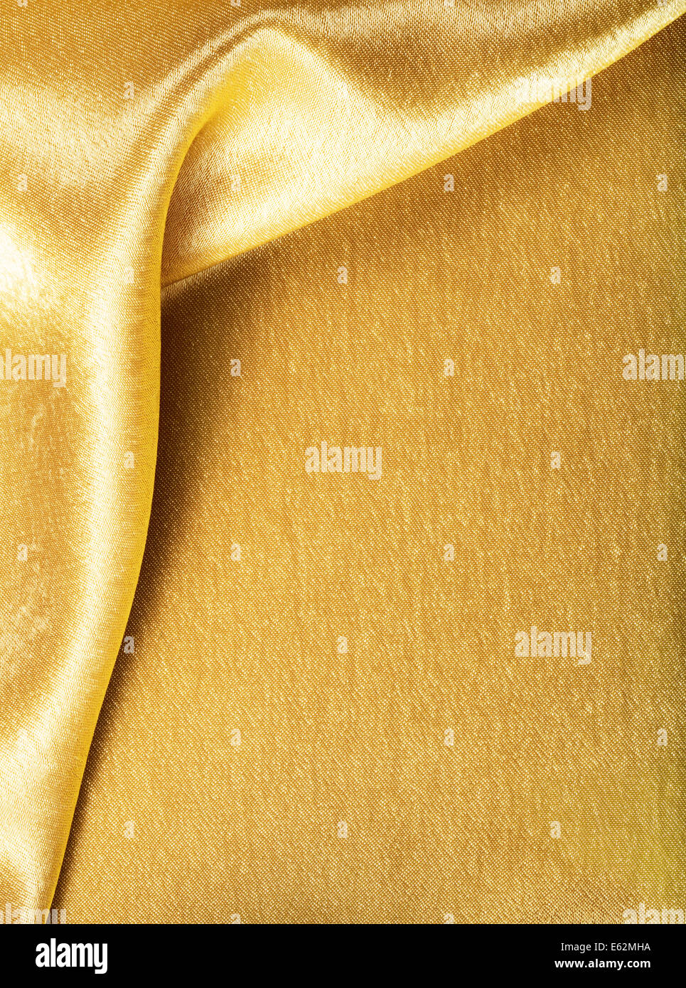 Golden Fabric silk texture for background Stock Photo