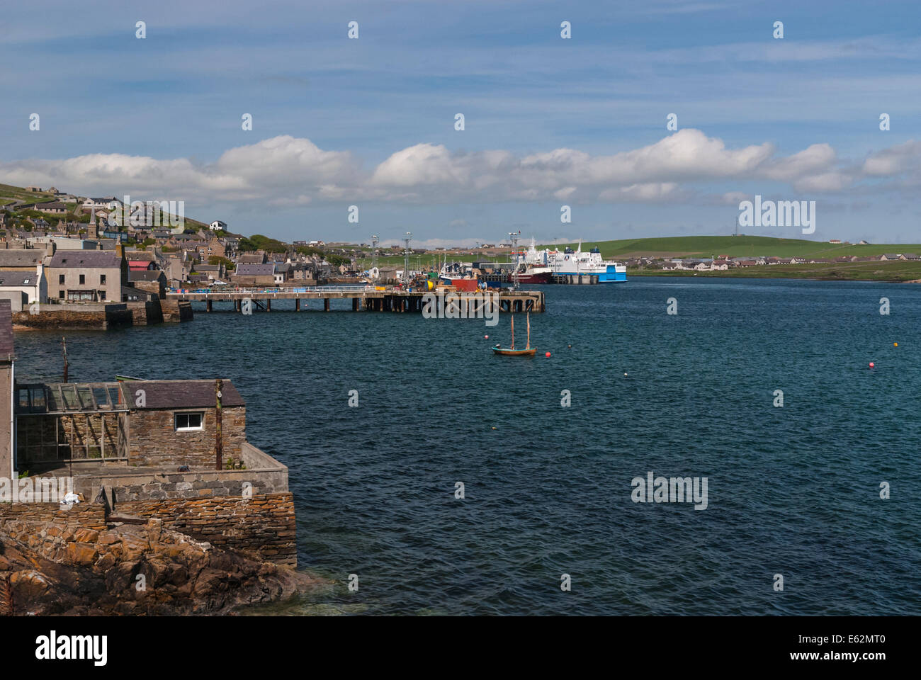 Stromness harbour Orkney with a North Link ferry at berth Stock Photo
