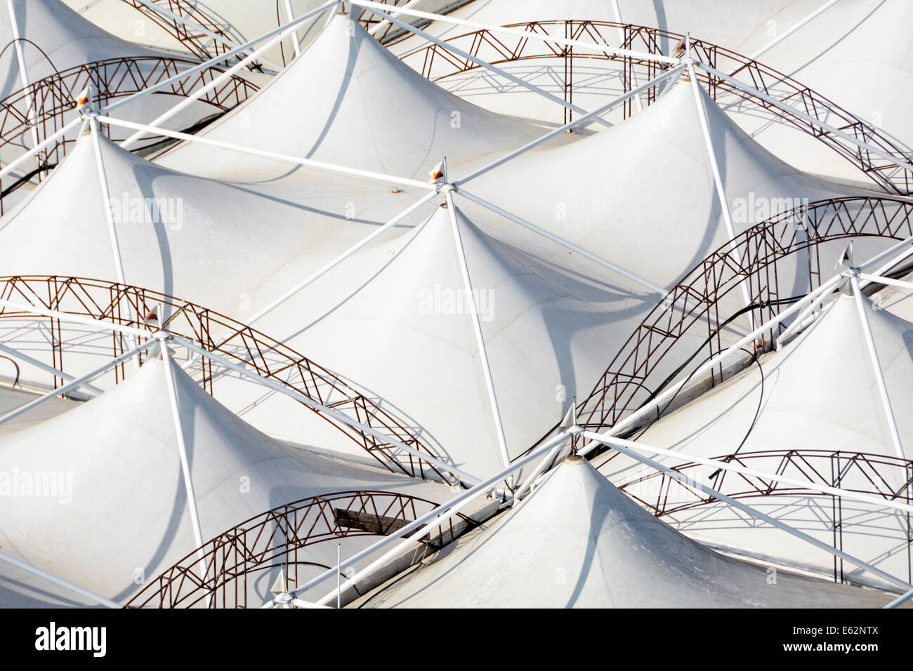 Aerial view from above looking down from above at  abstract patterns of roof panels on a temporary pavilion marquee type structure Bari Puglia Italy Stock Photo