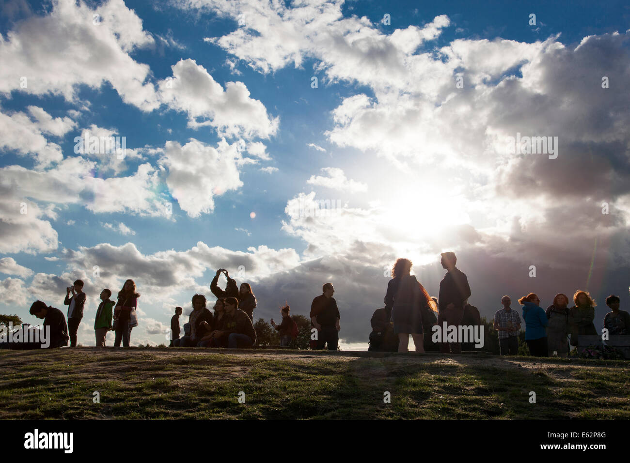 London, England - August 10th, 2014 Crowds watching from Primrose Hill, waiting for the Supermoon to appear Stock Photo