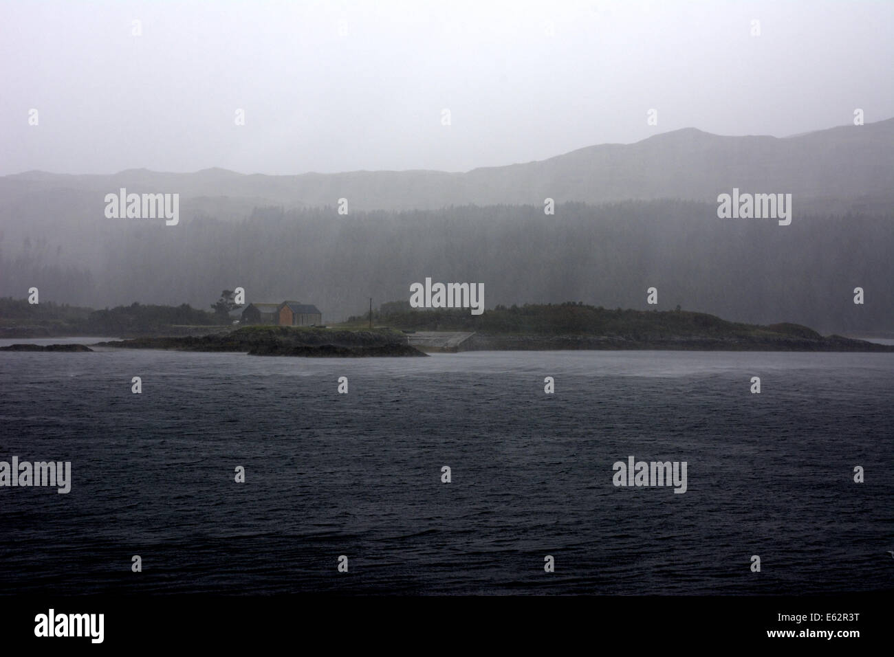 Rain streams down at Kylesku NW Scotland; the site of the training for secret 3 man submarines from which the brave frogmen wenttourism Stock Photo