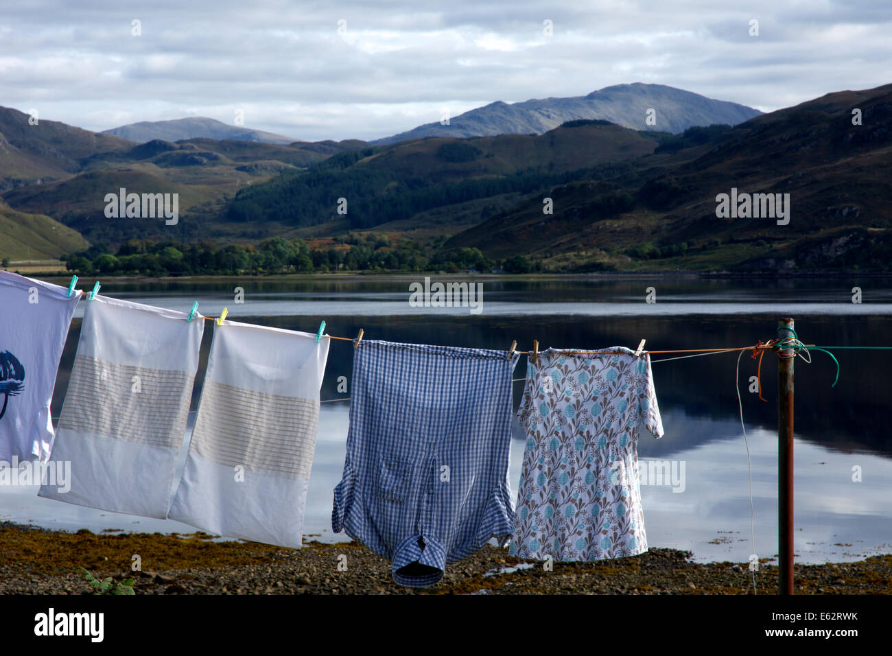 Fresh Clean Clothes Are Drying Outside. Clothes Hanging To Dry On