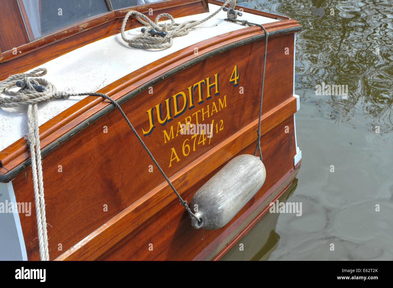 Norfolk broads boat cruiser holiday boating wooden Judith class moored rope Stock Photo