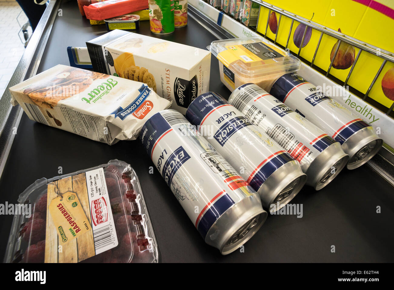 Lager beer cans and general food on checkout in LIDL supermarket Stock  Photo - Alamy