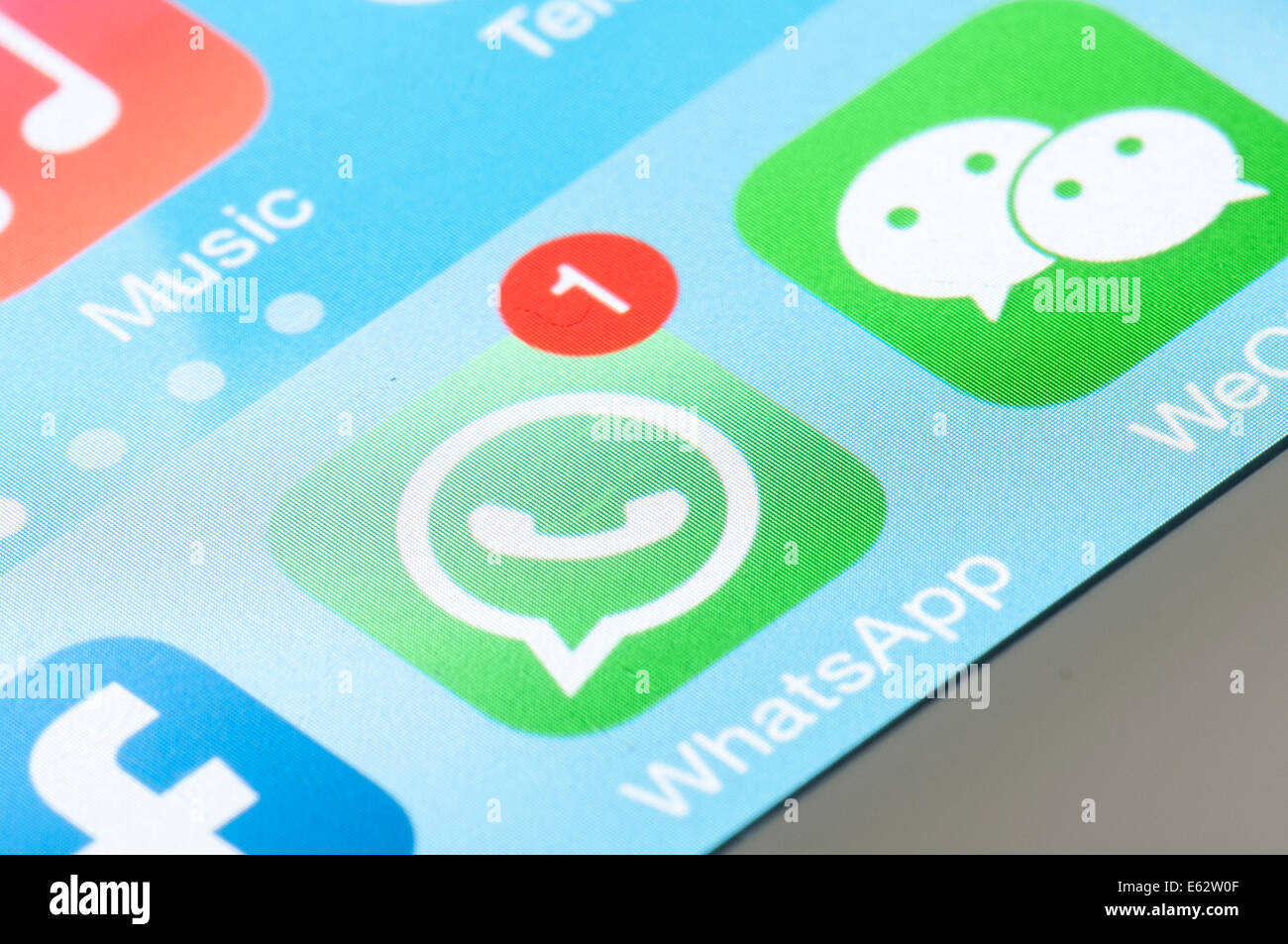 WhatsApp whats app logo icon in mobile screen Stock Photo