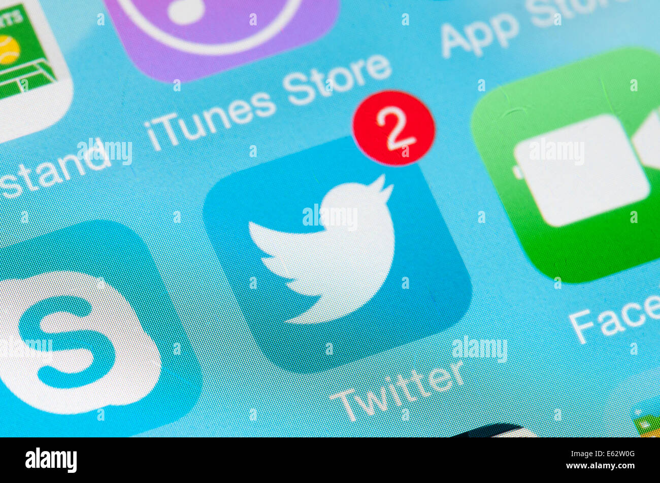 Twitter logo icon in mobile screen Stock Photo