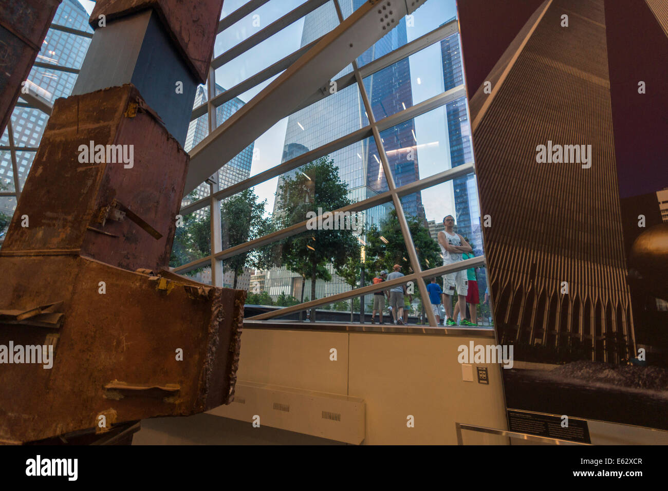 Manhattan, New York. People outside the 9/11 Memorial look into the