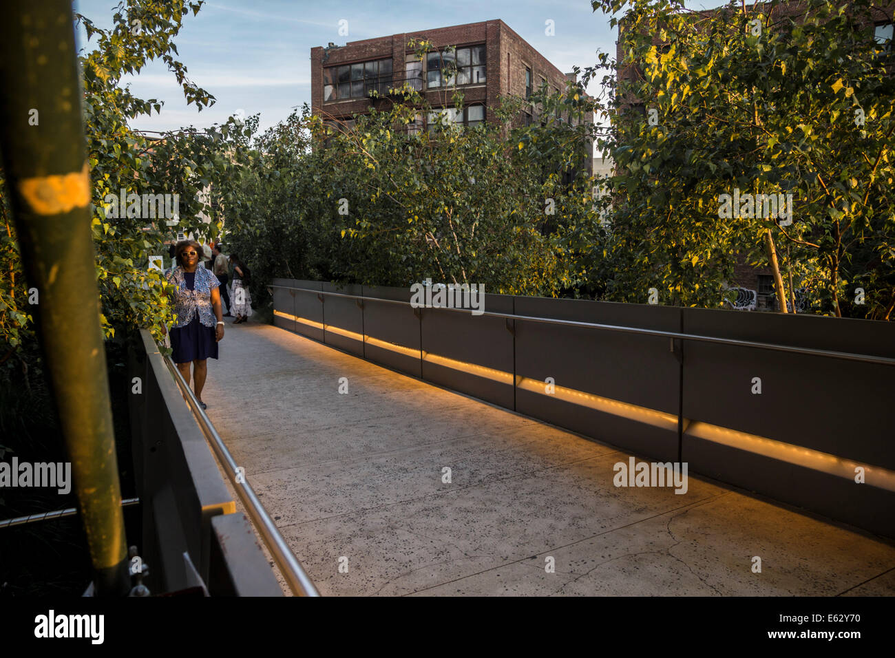 Dusk at the High Line in New York, an abandoned elevated railway turned ...