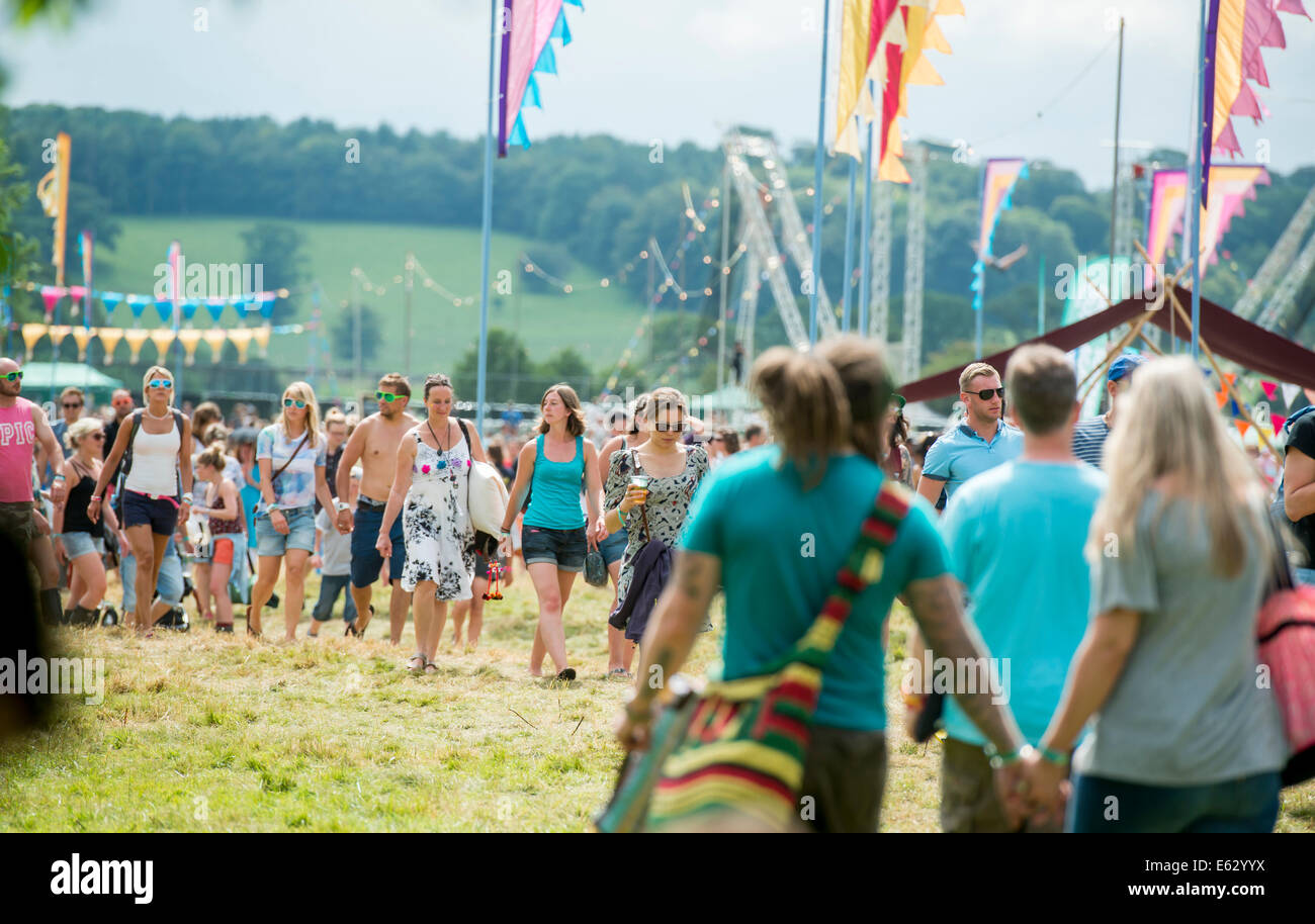 Festival arrivals enjoy the weather at the Somersault Festival in Filleigh, Devon, UK Stock Photo